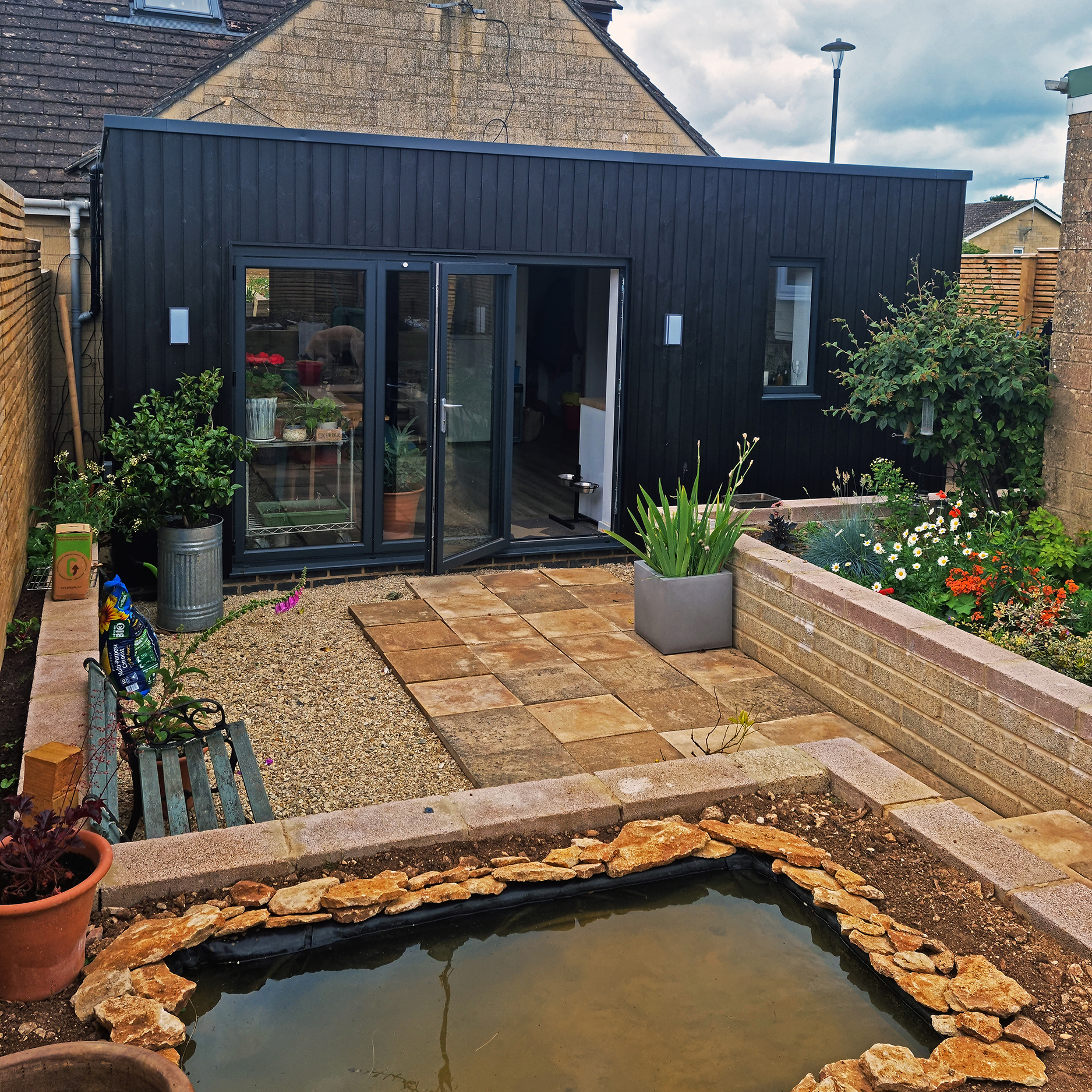 Black clad flat roof extension